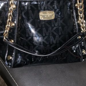 Micheal kors black and gold authentic bag